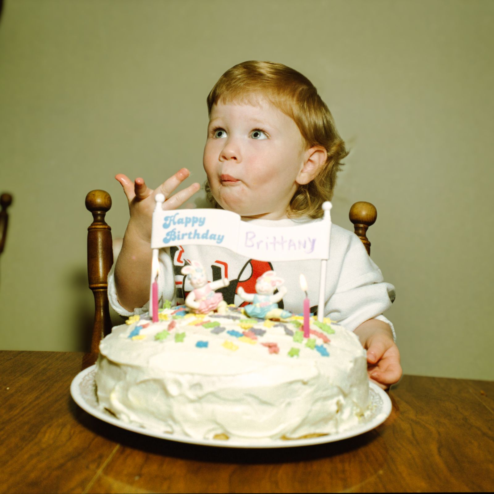 A child celebrating a cavity-free checkup